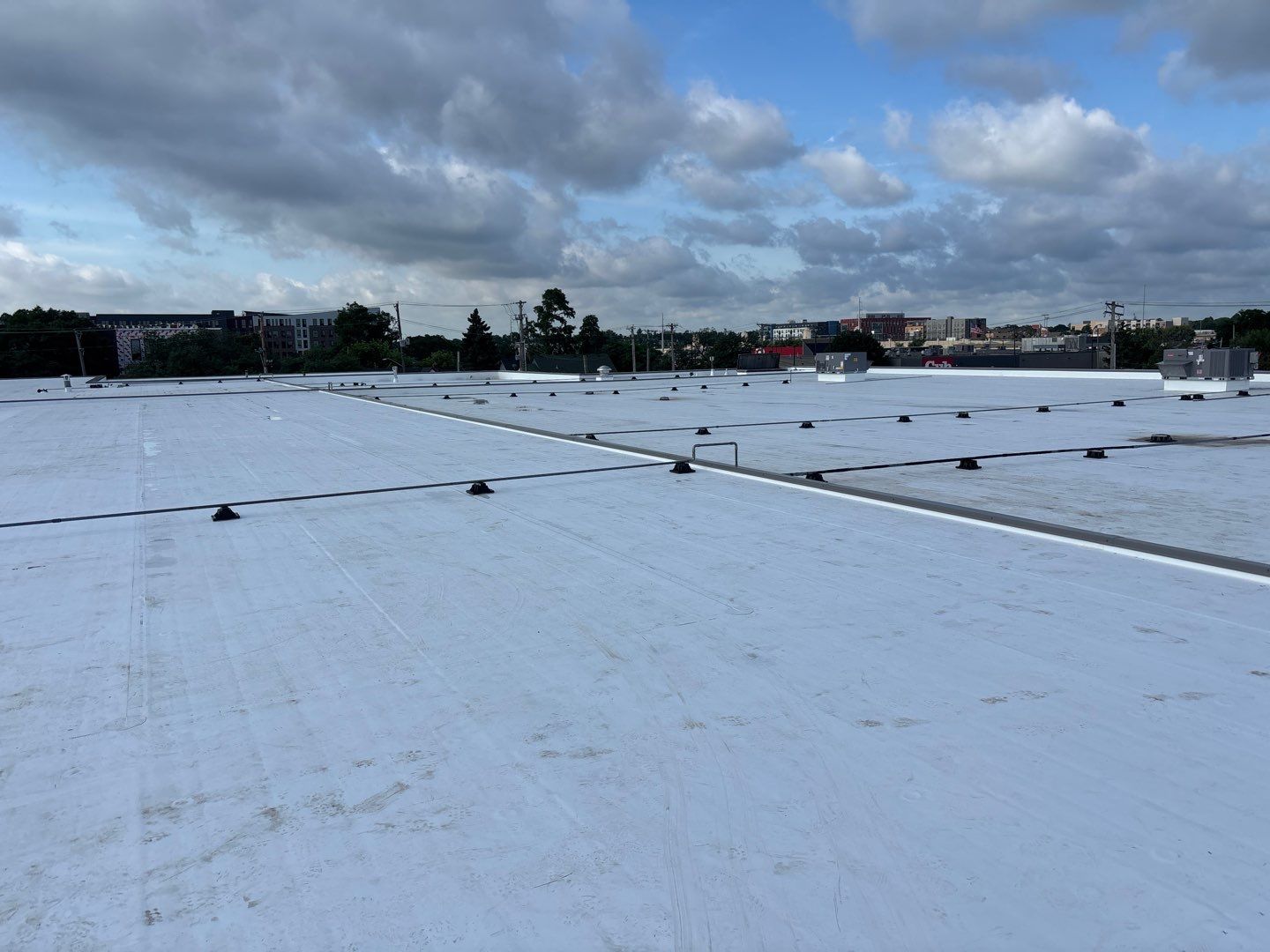 ABC Supplies Minneapolis Adhered TPO Commercial Roof Replacement